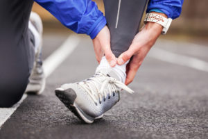 Female runner with an ankle injury